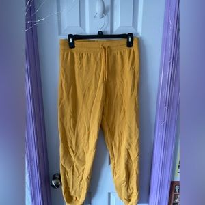 woman’s small mustard yellow sweatpants